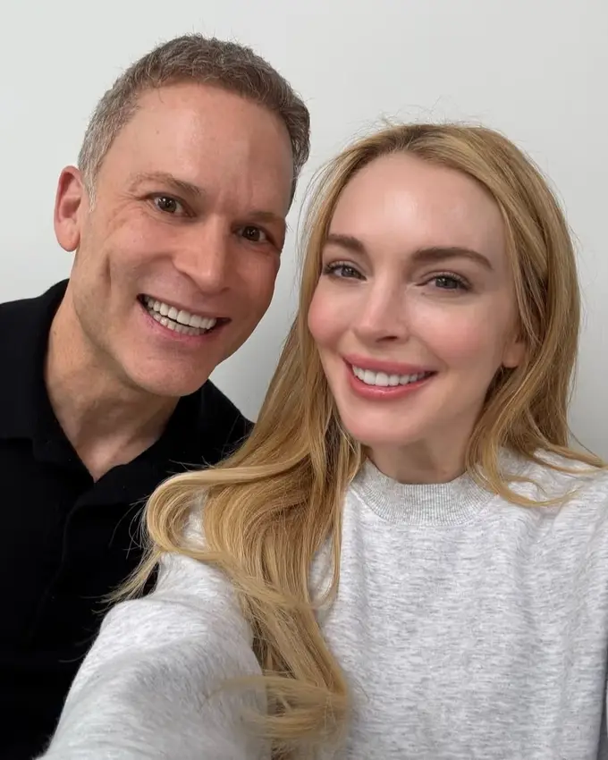 Dr. Jon Marashi with a patient after porcelain veneer treatment at his Brentwood, Los Angeles practice