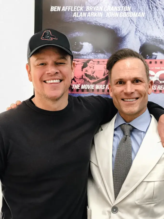 Dr. Jon Marashi alongside an on-camera performer whose veneers were designed for 4K film work